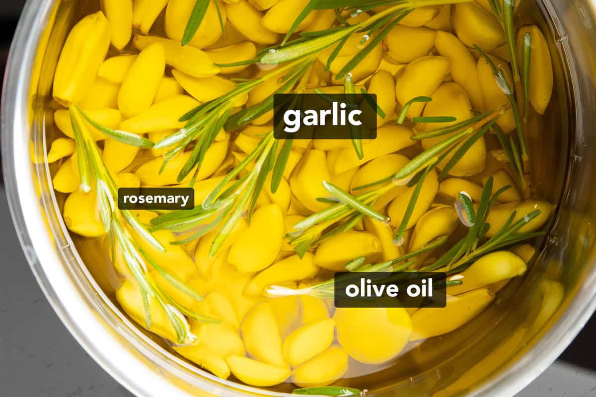Garlic Confit ingredients in a pan