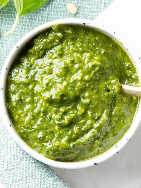 feature photo of vegan pesto in a white ceramic bowl