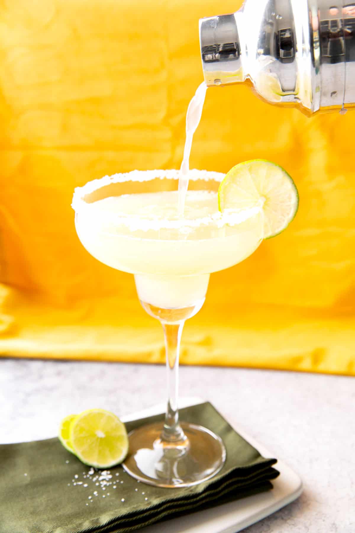 Photo showing How to Make this cocktail – final pour from cocktail shaker