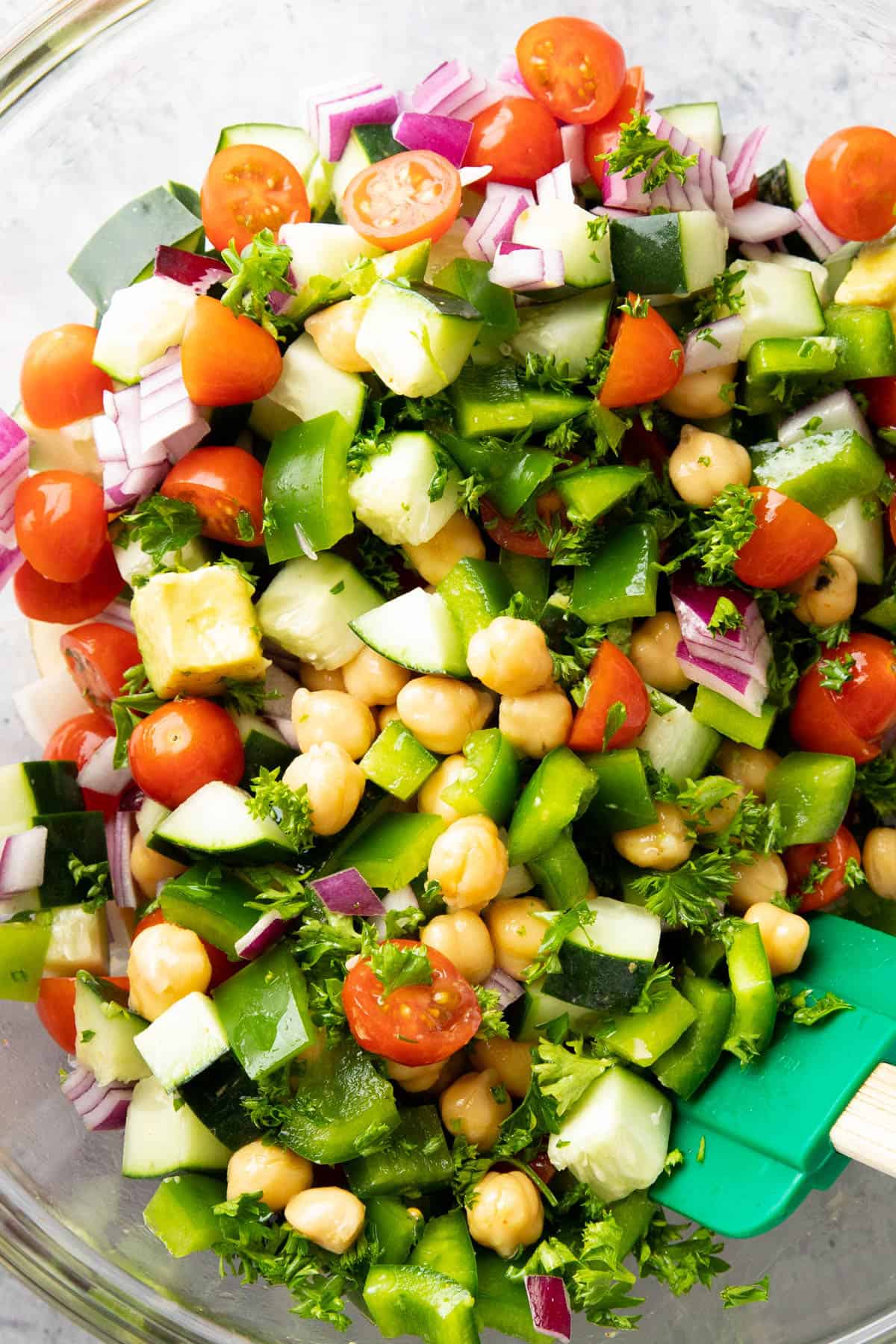 all ingredients for this chickpea salad recipe in a bowl