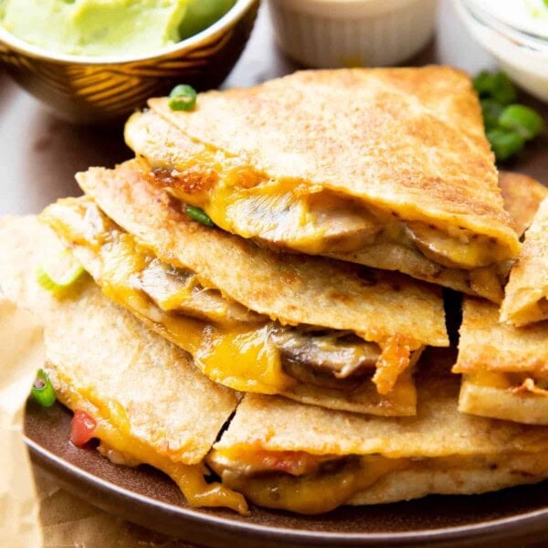 Mushroom Quesadilla sliced and stacked on a plate