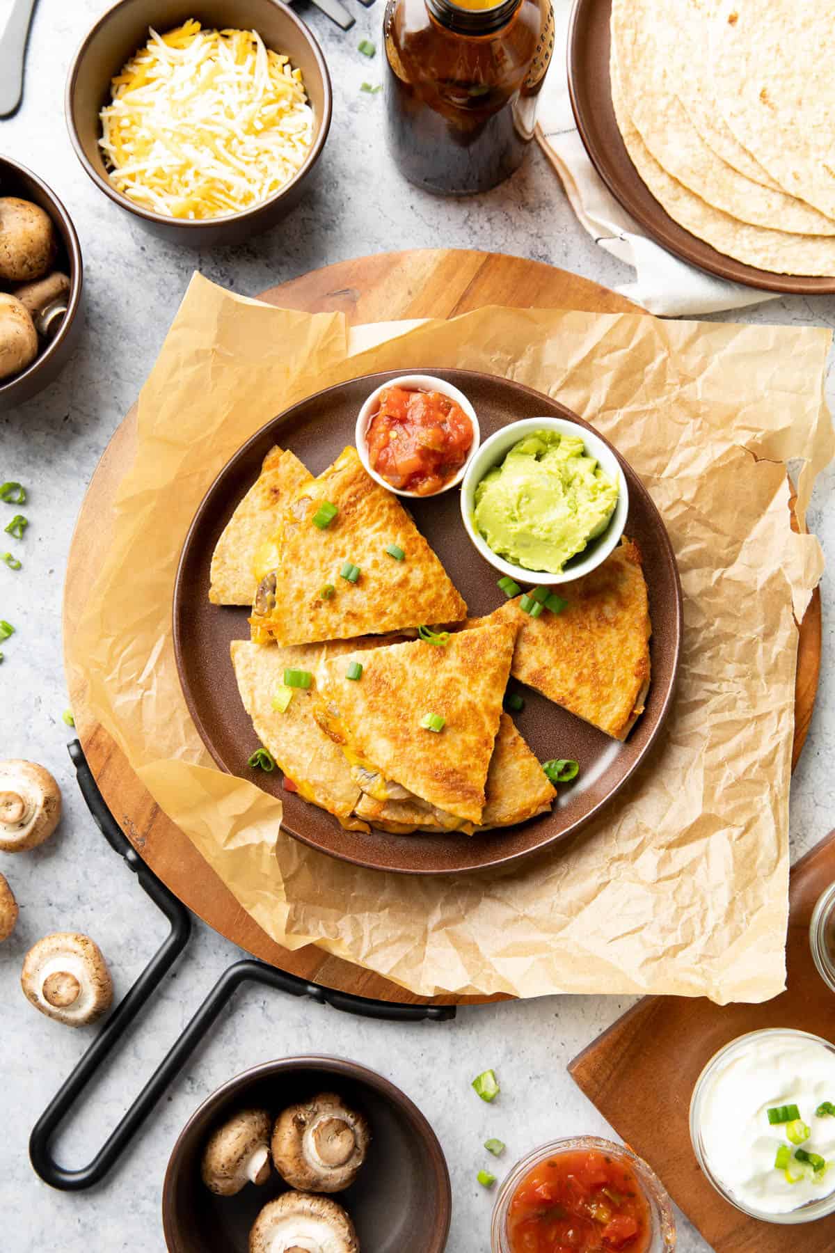 this Mexican inspired main dish on a brown plate over brown parchment