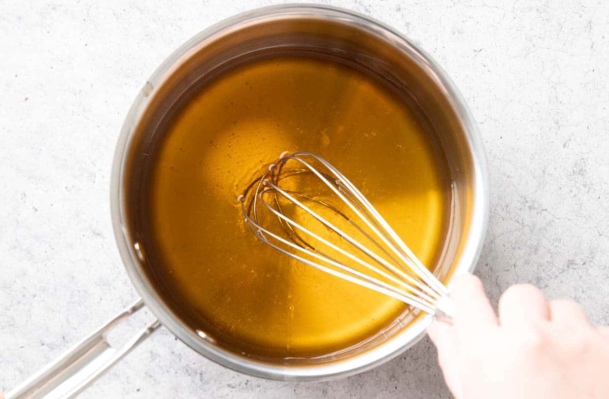 Whisking together the two ingredients needed to make this recipe