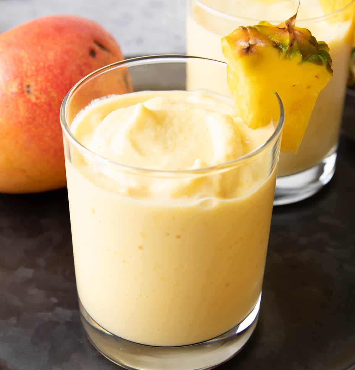 Close up of the thick, creamy smooth texture of this Mango Pineapple Smoothie