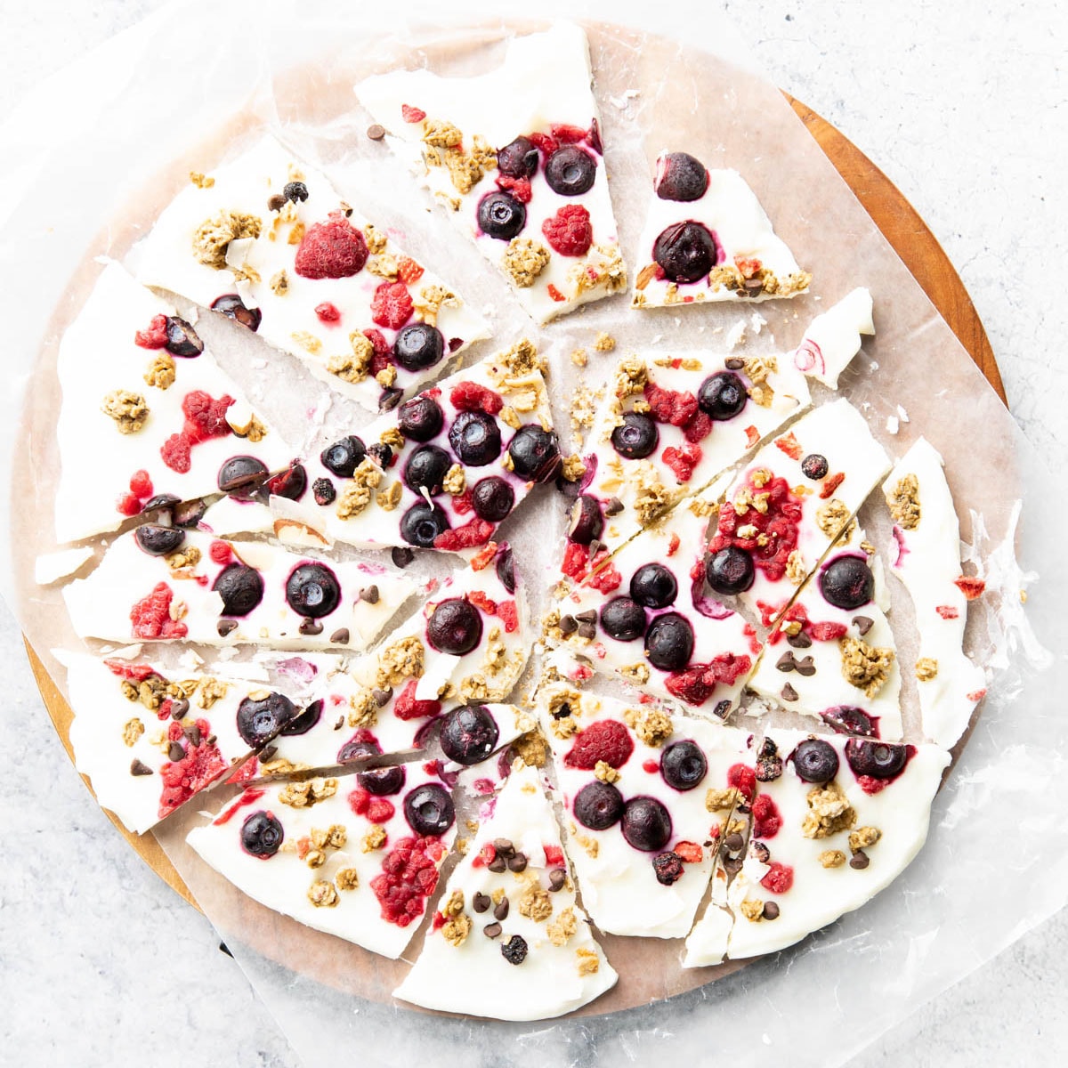 newly sliced bars with blueberries and granola topping