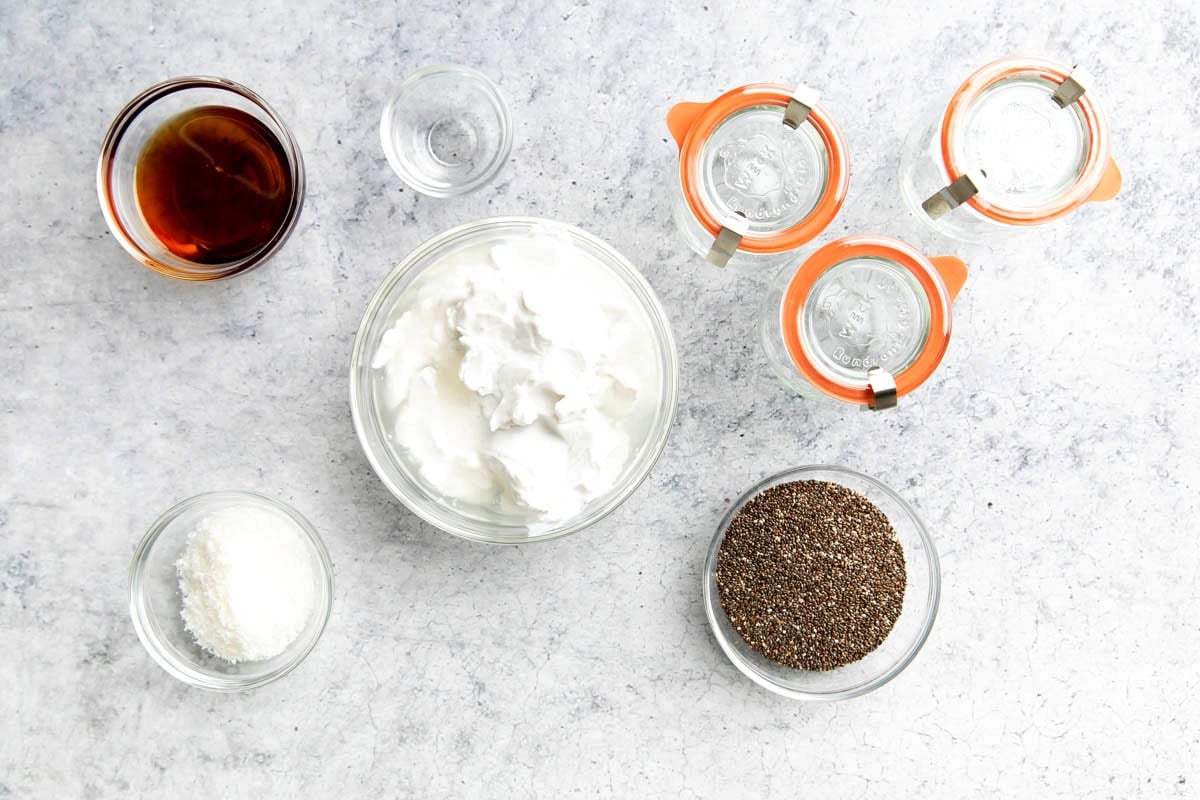 Coconut chia pudding recipe ingredients include coconut extract, chia seeds, coconut milk, maple syrup, and shredded coconut.