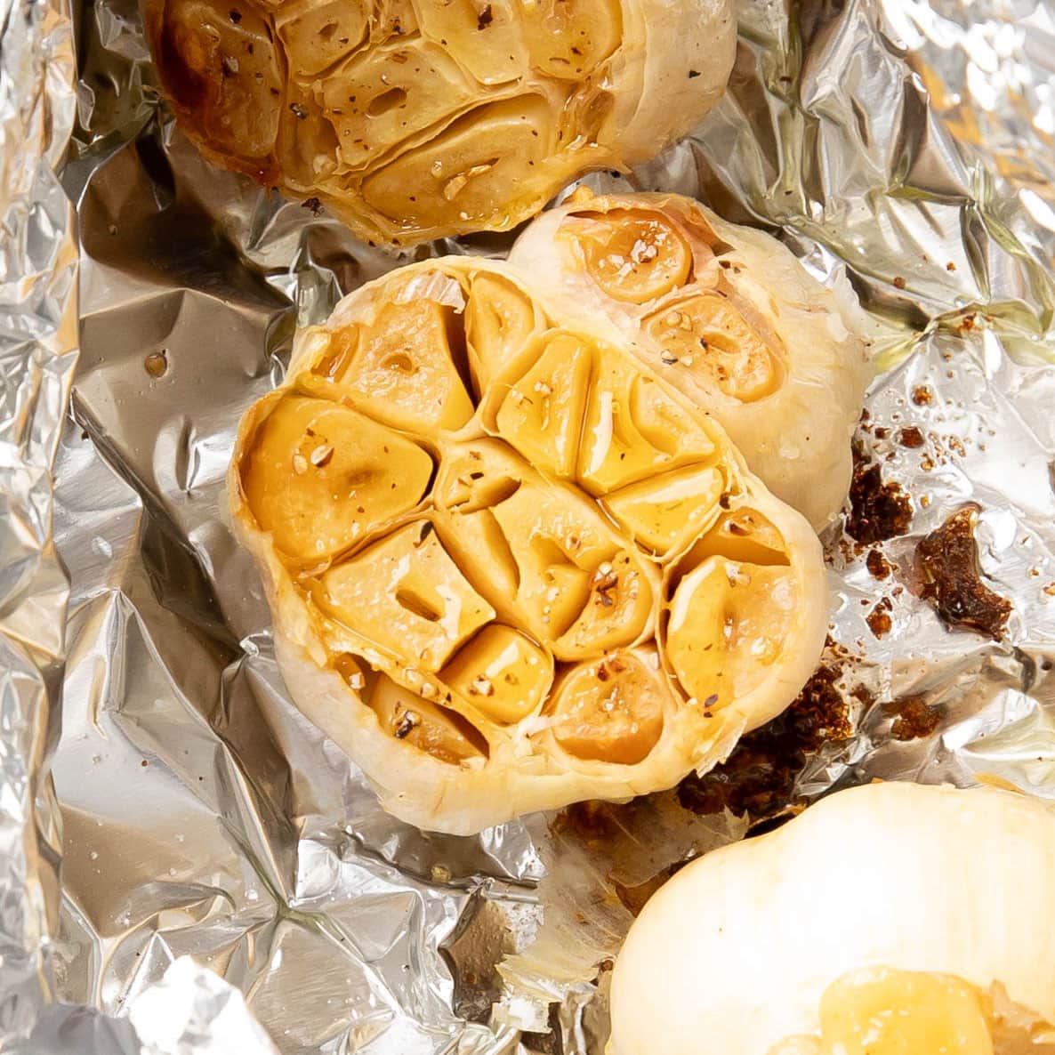 Close up of roasted garlic after roasting in oven