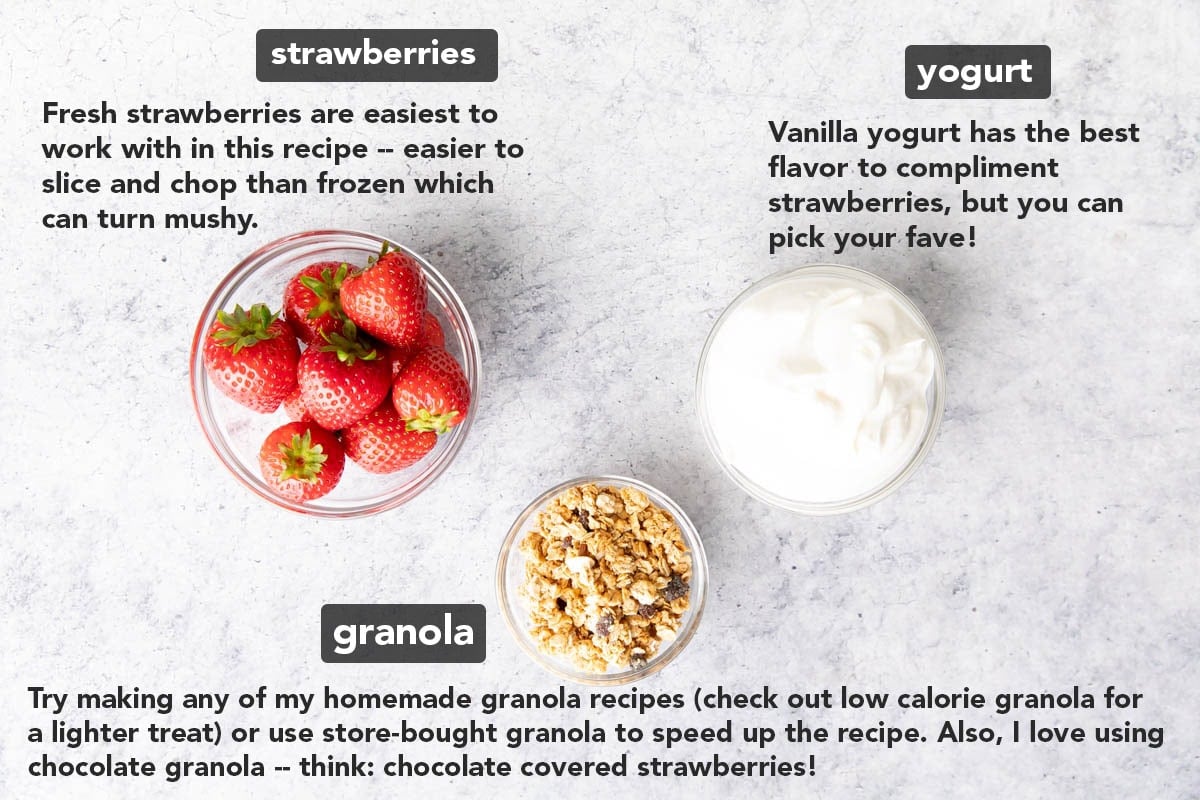 strawberry yogurt bites ingredients including vanilla yogurt, strawberries and granola measured in bowls