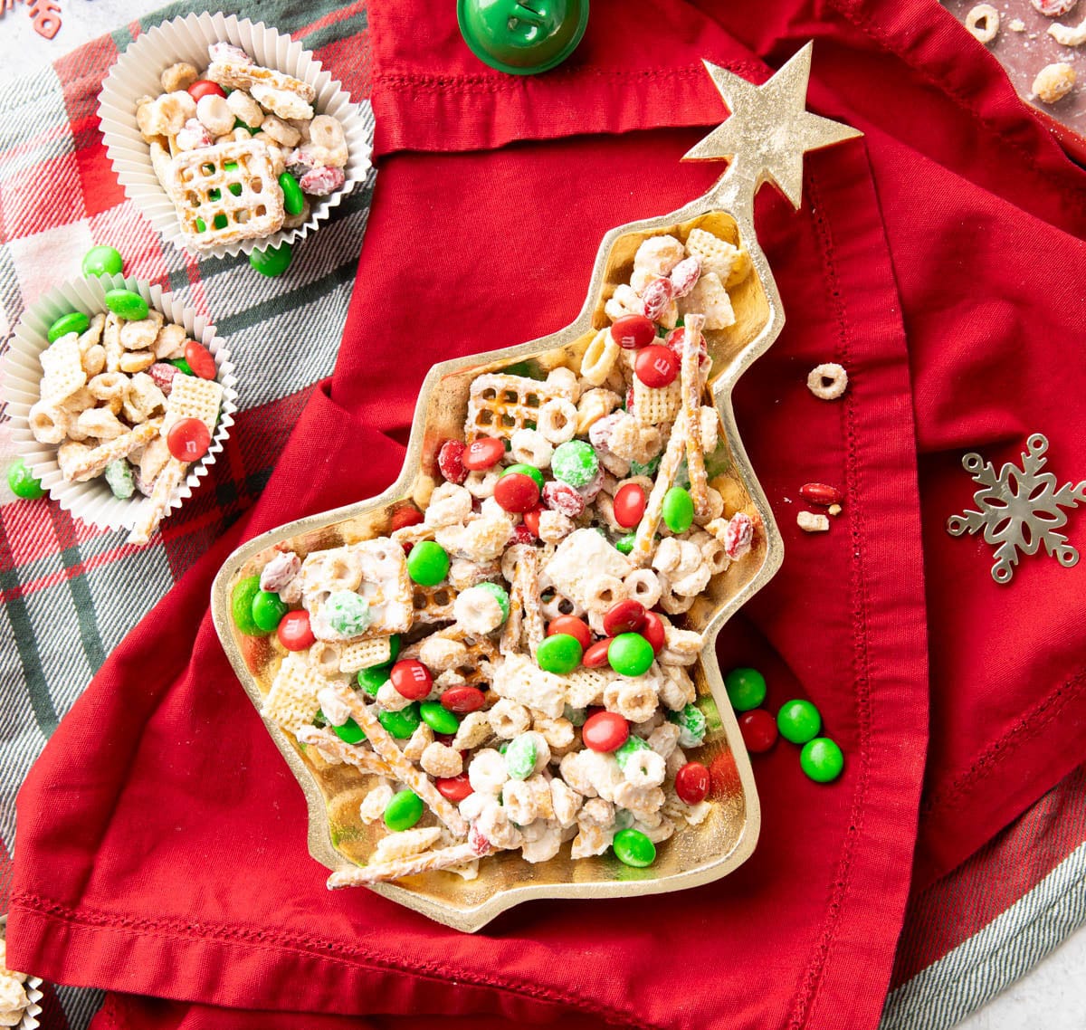 Christmas tree tray filled with festive holiday snack mix