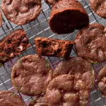 Moist and fudgy brownie bites cooling on a baking rack