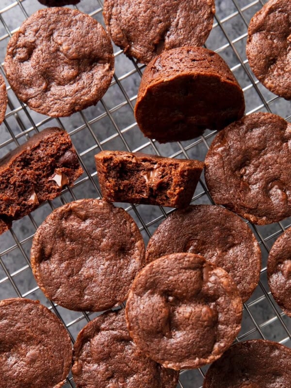 Moist and fudgy brownie bites cooling on a baking rack