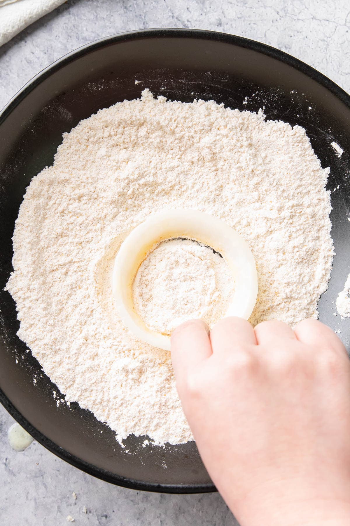 Dredging in seasoned flour mixture