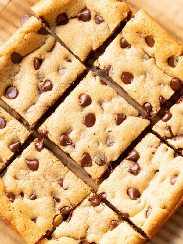 Close up of sliced Peanut Butter Blondies on parchment paper