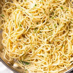 Garlic Butter Pasta freshly made in a skillet topped with parmesan