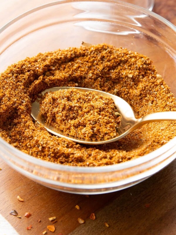 taco seasoning recipe in a small bowl with a spoon in it