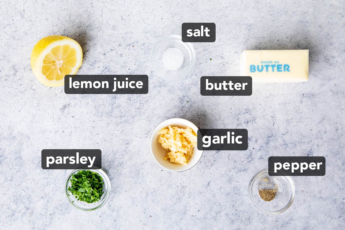 Ingredients for this garlic butter sauce for pasta including butter, minced garlic, salt and pepper, parsley, and fresh lemon