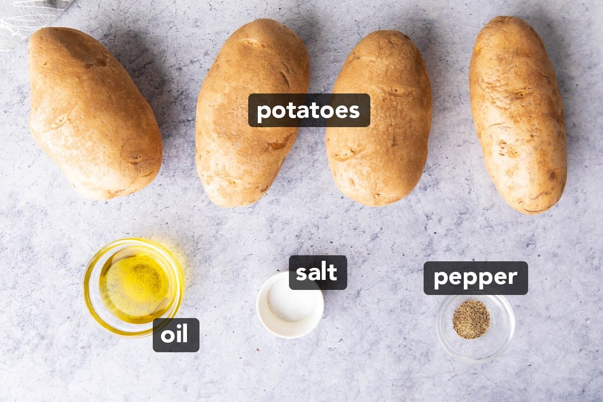 Oil, salt, pepper, and russet potatoes show the easy ingredients for this recipe