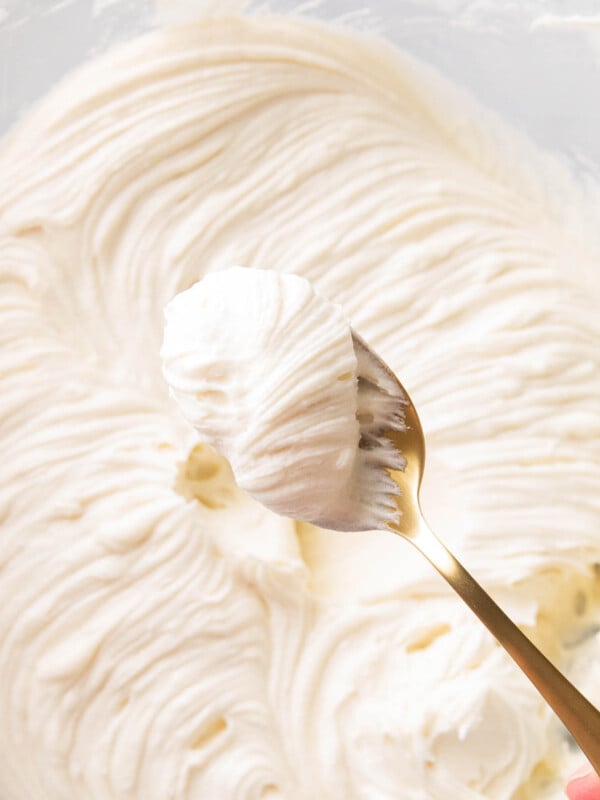 A spoon of thick rich and creamy Cream Cheese Frosting