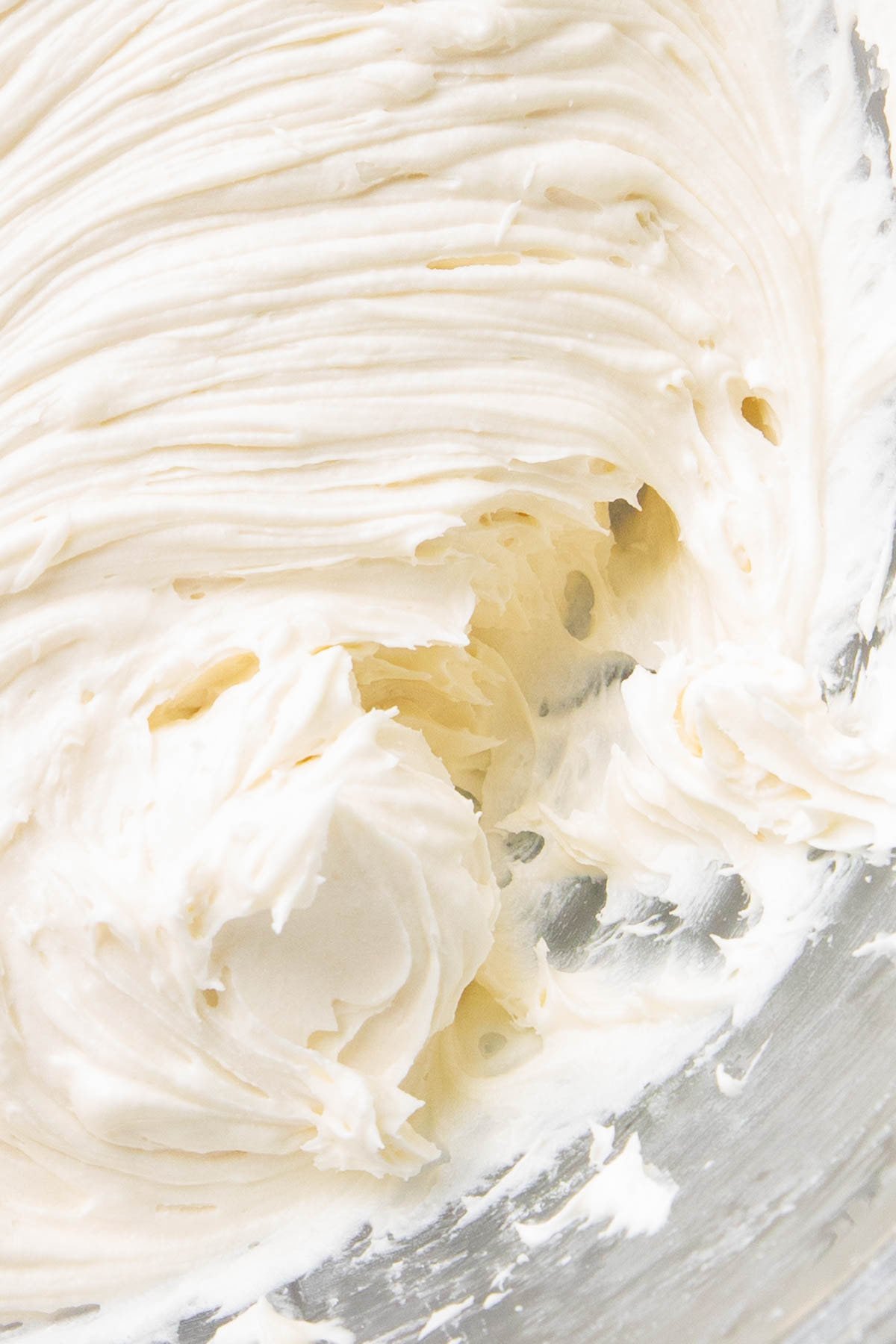 close up of this recipe to show the creamy, thick texture that’s perfect for piping