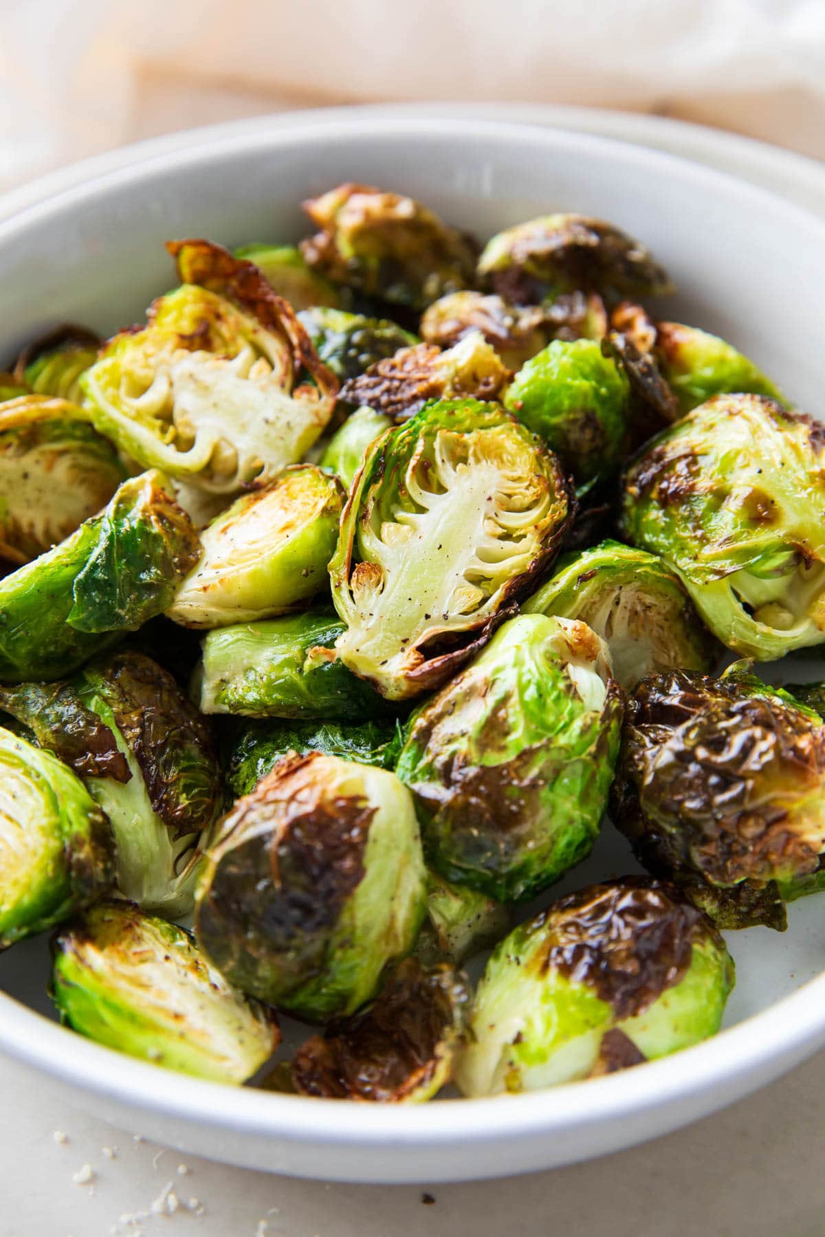 Air Fryer Brussels sprouts with perfectly cooked and charred edges and light seasoning