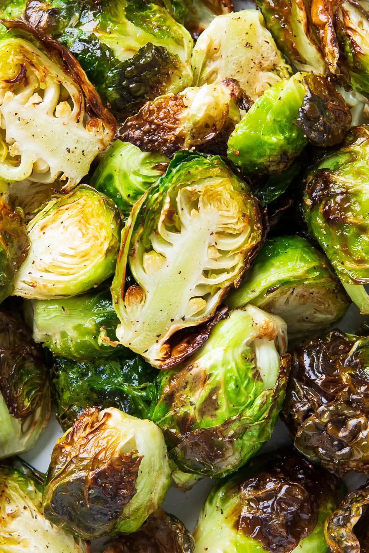 close up of air fryer Brussel sprouts to show well cooked texture