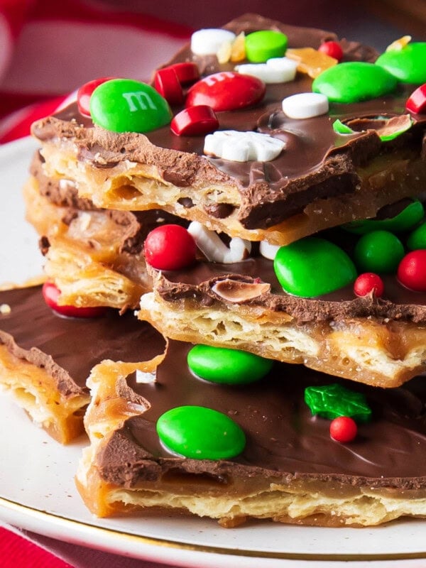 Close up of Christmas Crack in pieces on parchment paper