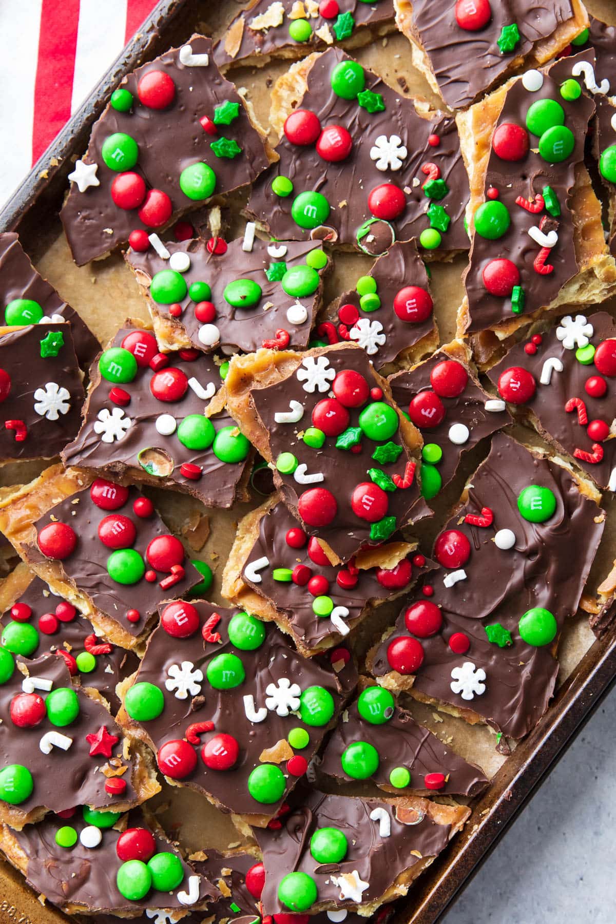 A large baking sheet filled with this salty and sweet holiday seasonal treat