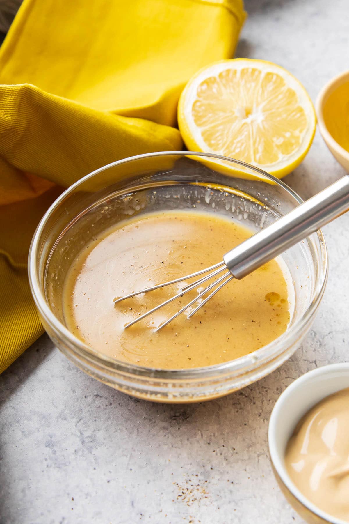 A bowl of the best Honey Mustard dressing recipe shows the tangy and sweet texture that’s perfect for salads and dips