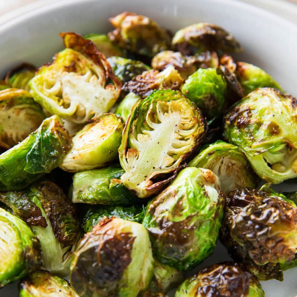 Air Fryer Brussels sprouts with perfectly cooked and charred edges and light seasoning