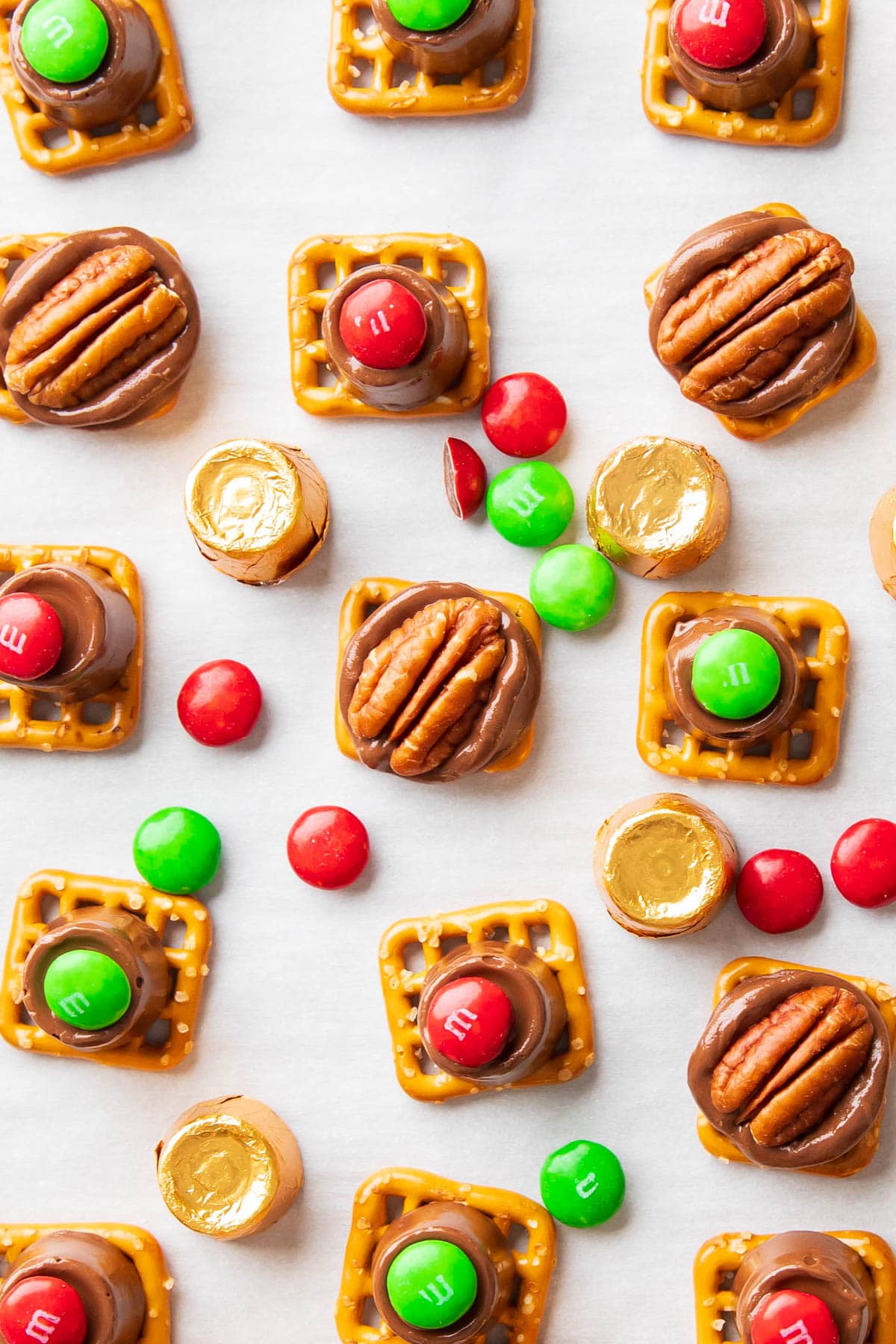 close up of this chocolate, caramel, pretzel, and pecan delights recipe.