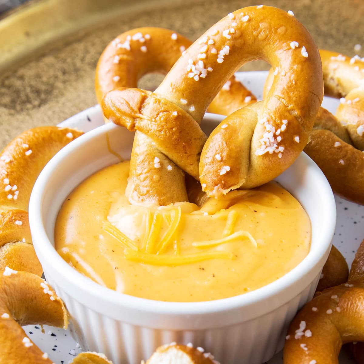 Beer cheese dip served in a dipping bowl