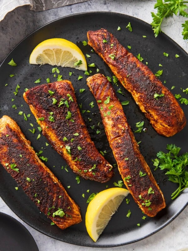 Close up of Blackened Salmon to show perfectly crisped cajun seasoning crust on tender salmon