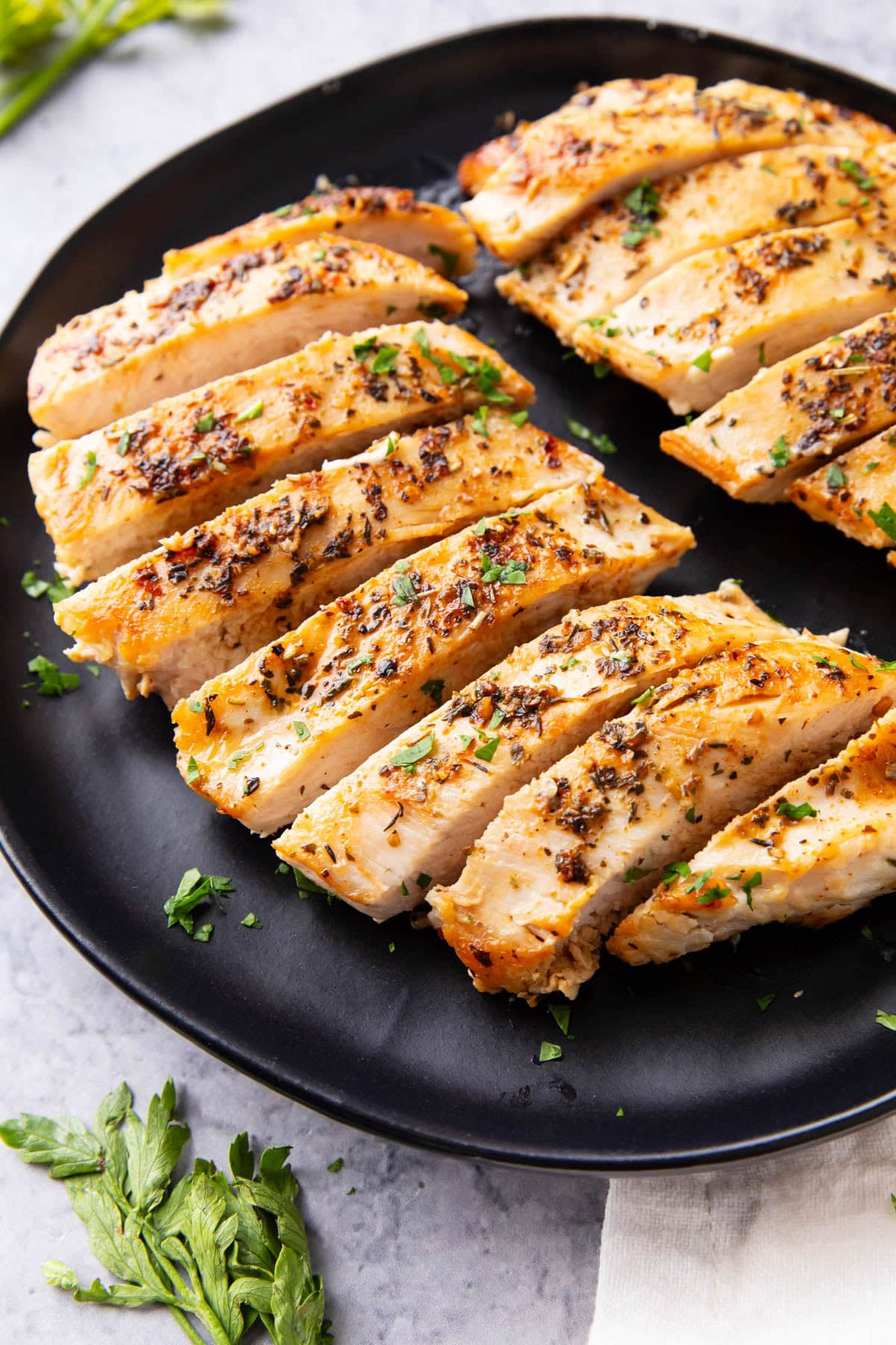 Plate of sliced pan seared chicken breast