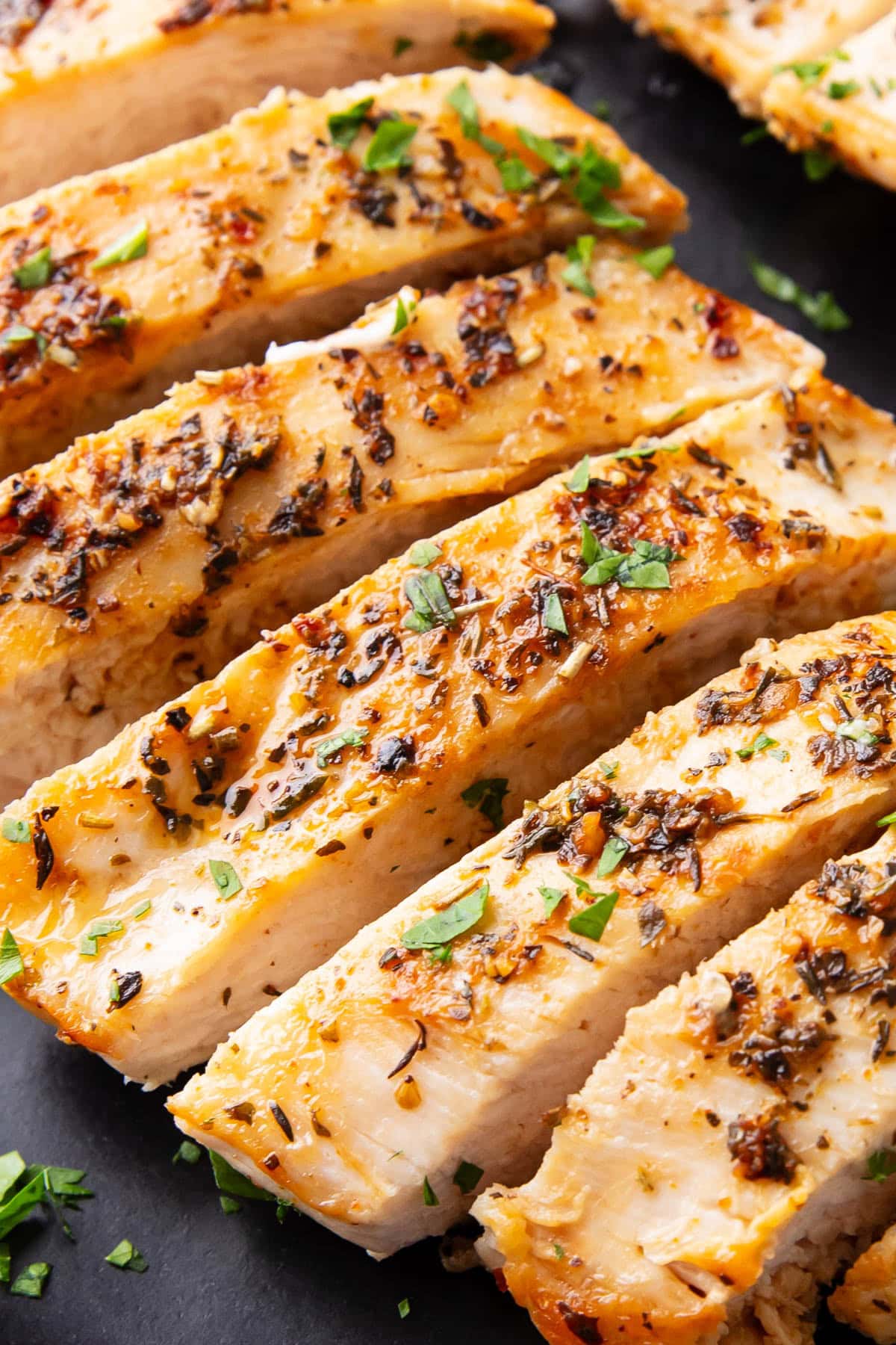 a close up of this pan seared chicken breast recipe to show the juicy and tender texture