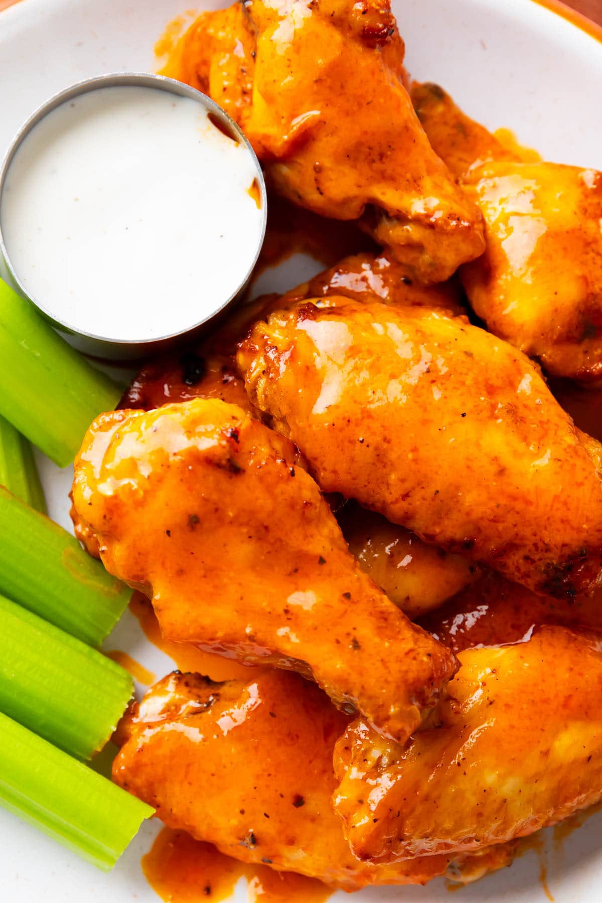 Extra hot sauce coats this buffalo wings recipe made in an air fryer.