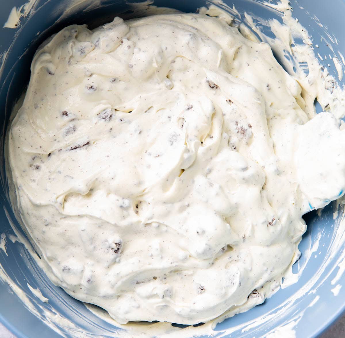 Final step in making Oreo Fluff - Oreos are folded completely into the creamy base