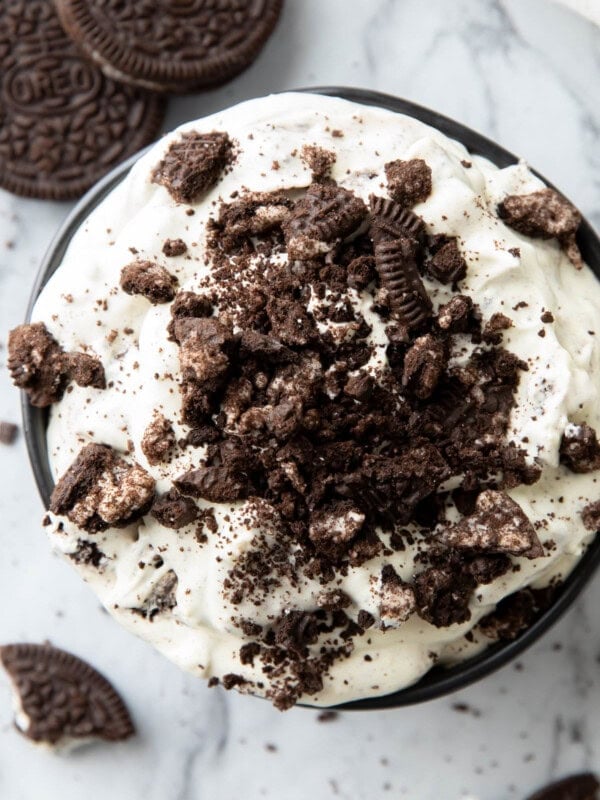 Close up of thick and creamy Oreo Fluff served in a bowl with crushed cookies on top