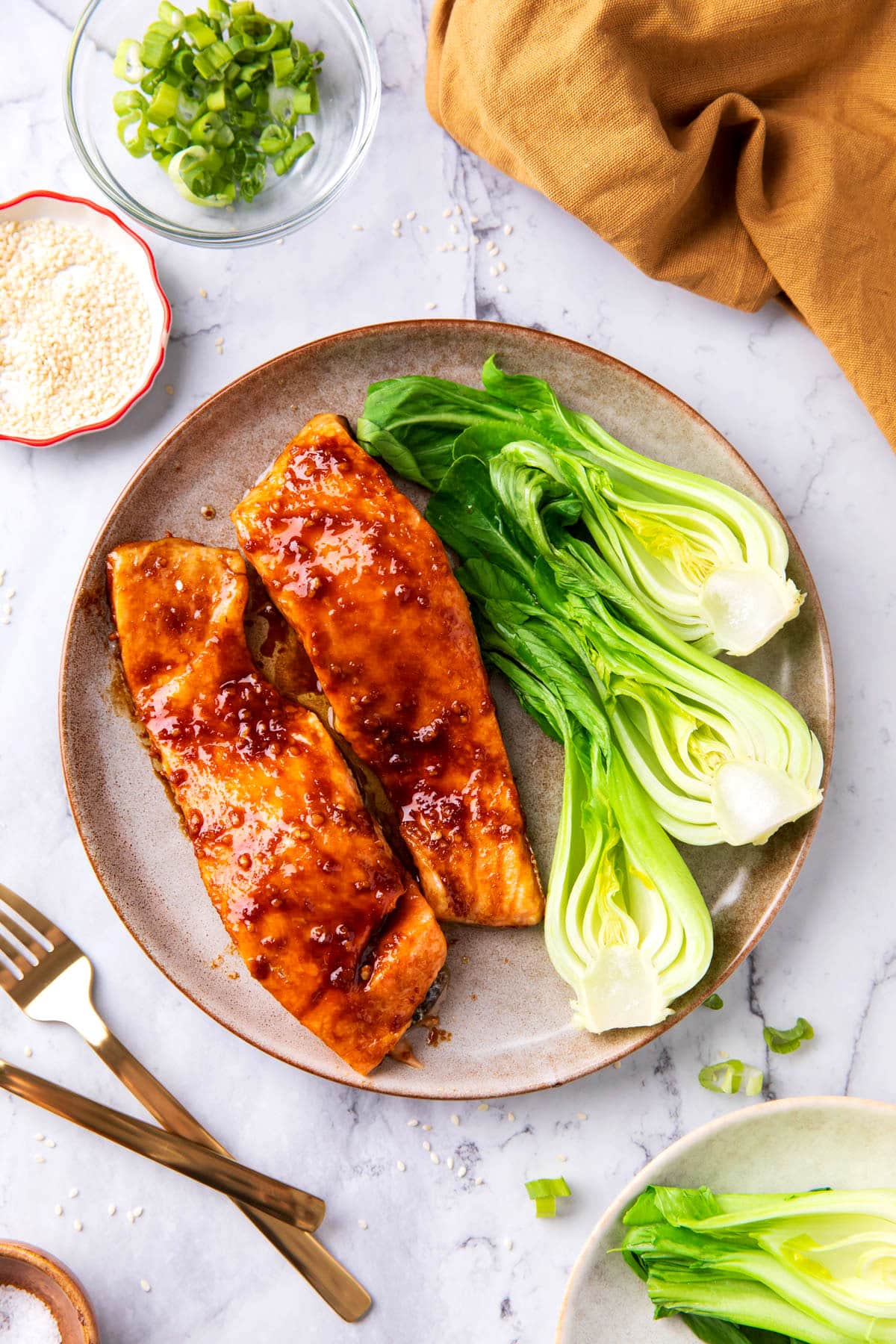 Asian salmon recipe is glazed soy sauce, brown sugar and hoisin Asian sauce that makes this easy fish recipe flaky and flavorful.