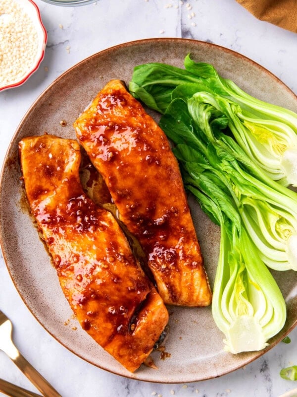 This Asian Salmon recipe is tender and flaky with a homemade sauce that glazes the salmon during cooking