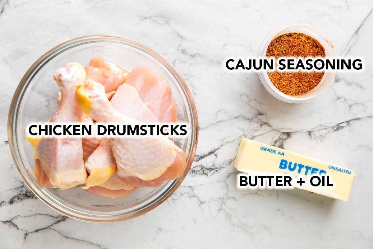 3 ingredients for Cajun chicken drumsticks include raw chicken drumsticks, homemade Cajun seasoning, and butter.