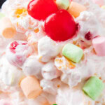 Ambrosia Salad recipe with Cool Whip short Pinterest image.