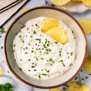Sour cream and onion dip is a thick and creamy appetizer dip made with sour cream, mayonnaise, and onion