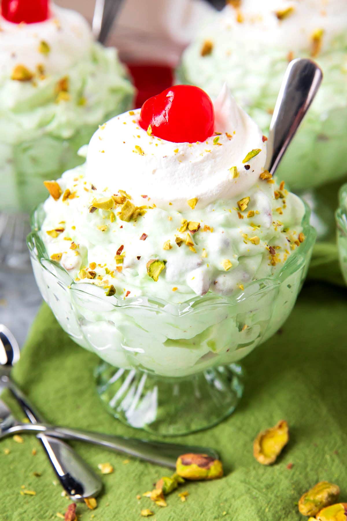 Close up of Pistachio Fluff recipe with pineapple served is fluffy and creamy for a no bake dessert.
