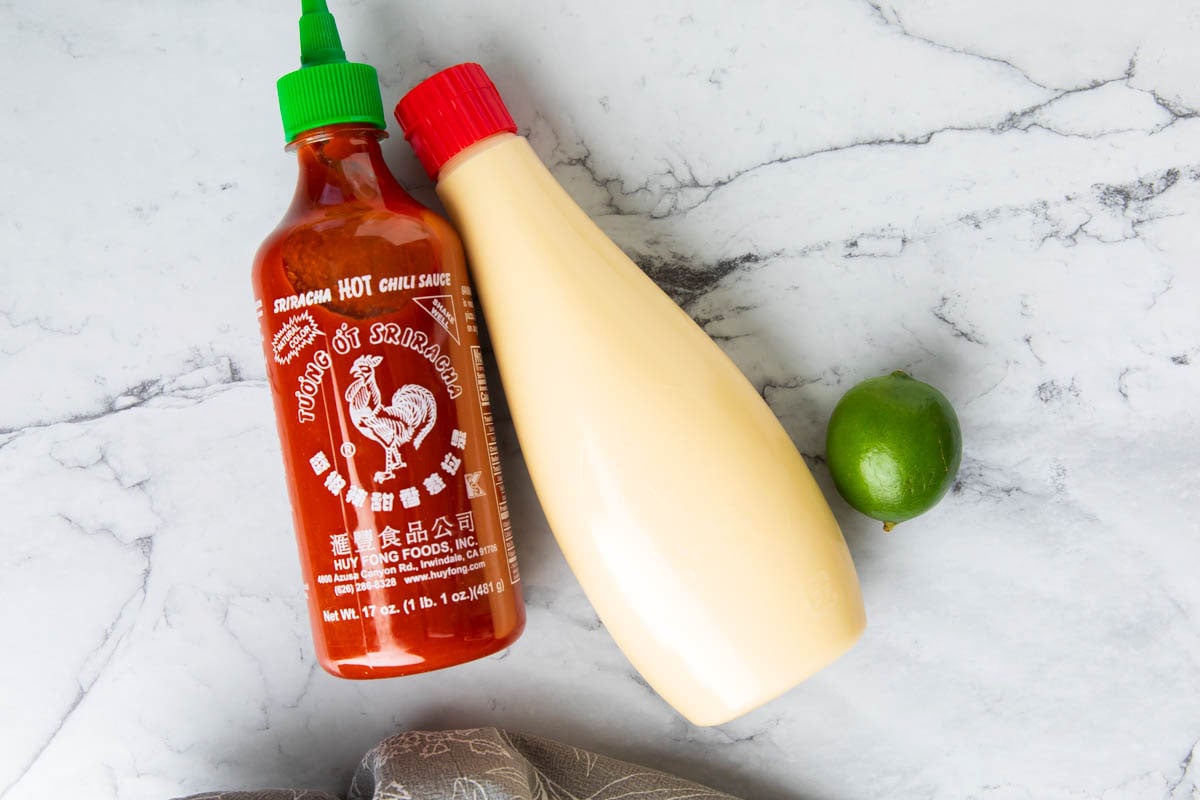 Spicy mayo sauce ingredients include sriracha, Japanese Kewpie mayonnaise, and a fresh lime.