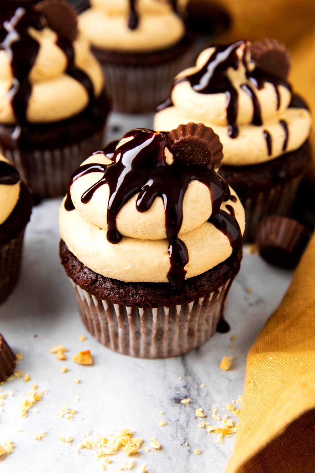 Close up of chocolate cupcakes and peanut butter icing.