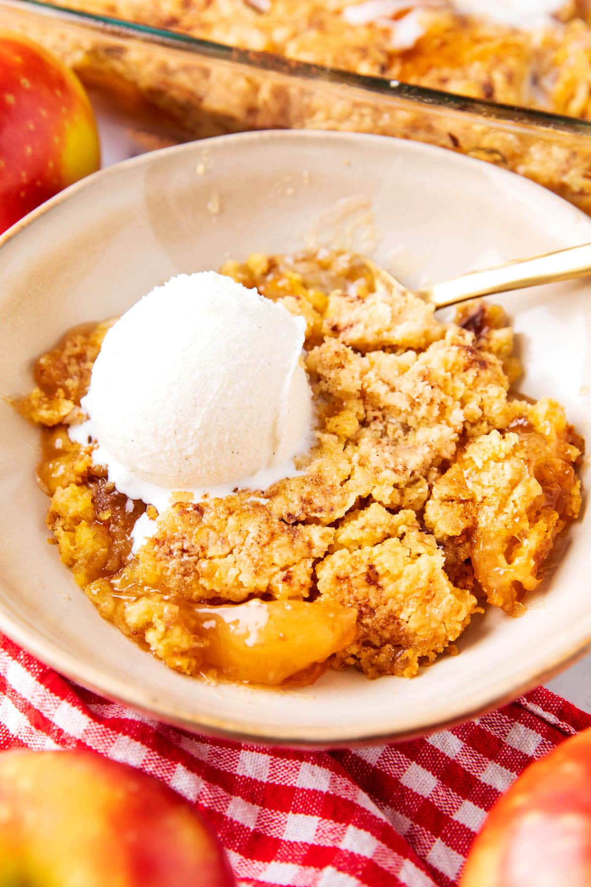 This fall baked recipe is served in a bowl with the freshly baked treat in its baking pan.