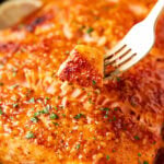 Close up of Honey Mustard Salmon is baked until tender and flaky with a delicious marinade sauce.
