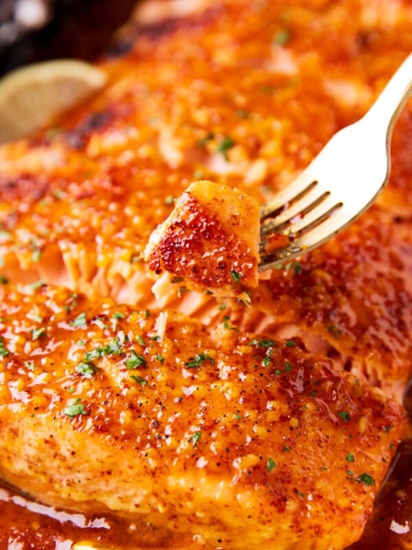 Close up of Honey Mustard Salmon is baked until tender and flaky with a delicious marinade sauce.