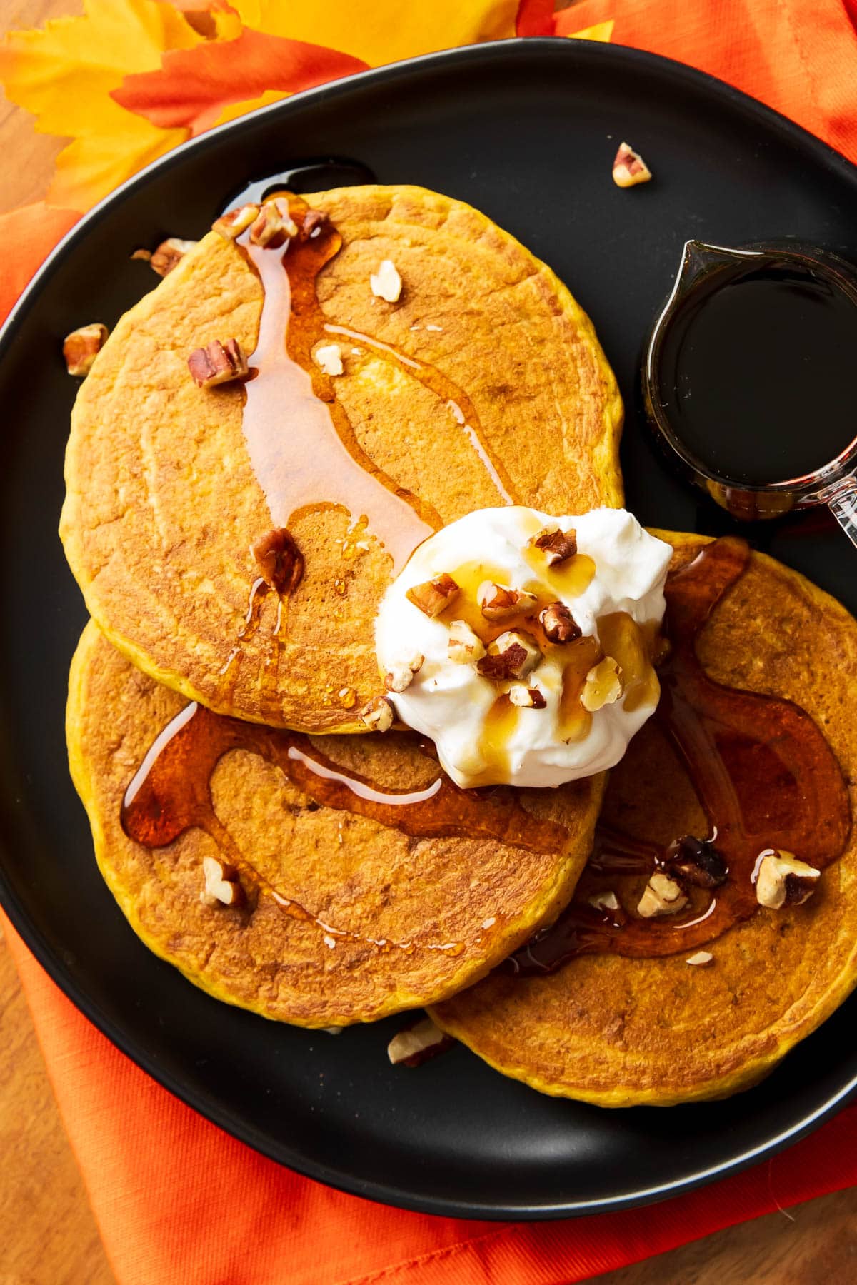 Closeup of this autumn pecan breakfast recipe shows moist and tender interiors with a lightly crisped exterior perfect for pouring pancake syrup onto.