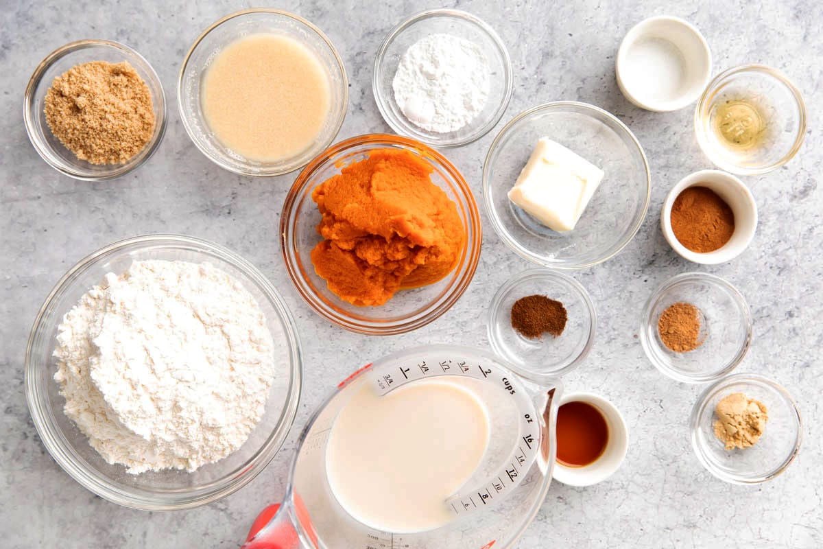 Pumpkin Pancakes ingredients including buttermilk, flour, pumpkin, pumpkin pie spice, salt, egg, brown sugar, butter, milk, and vanilla.
